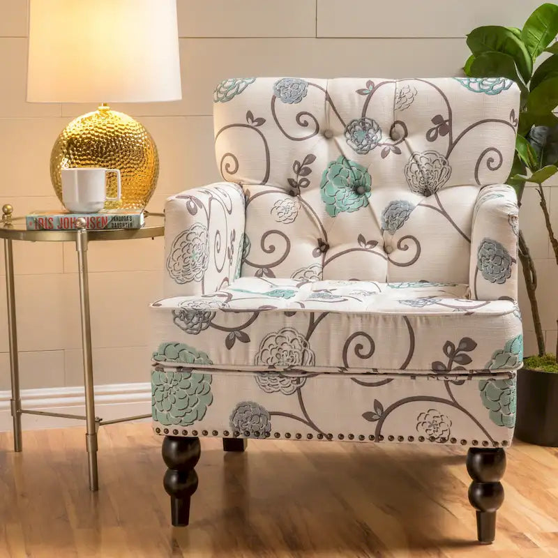 Fauteuil club capitonné avec boutons en tissu floral beige clair et bleu et garniture cloutée – Simple