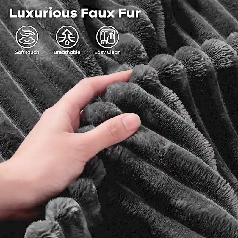Canapé trois places en velours moelleux gris/noir/beige avec ottomane